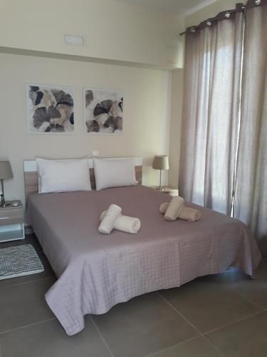 Plakoures Home - Kounoupidiana - Спальня