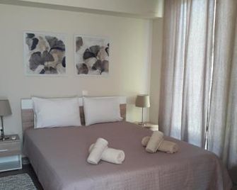 Plakoures Home - Kounoupidiana - Спальня
