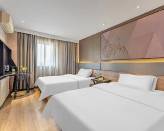 Iu Hotel Binzhou Bohai International Rtmart - Binzhou - Habitación