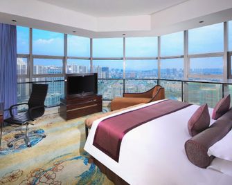 Howard Johnson by Wyndham Tianzhu Plaza Fuyang - Fuyang - Bedroom