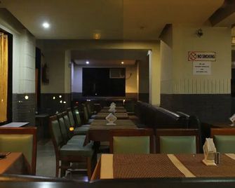The Shelter Hotel and Resorts - Utan - Restaurante