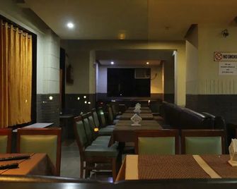 The Shelter Hotel and Resorts - Utan - Restaurante