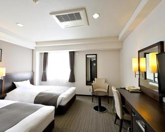 Saijo Urban Hotel - Сайджьо - Спальня