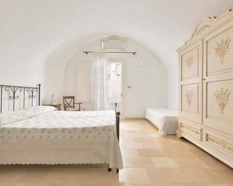 Appartamento Aldo Moro by BarbarHouse - Tuglie - Schlafzimmer