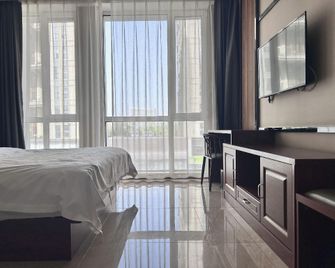 Carnival Hotel (Shengbaolong Branch) - Liaoyang - Bedroom