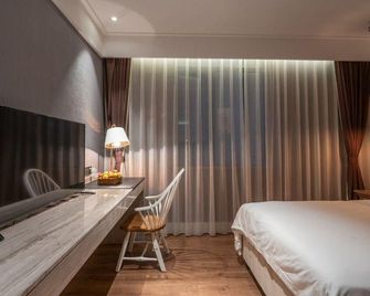 Zaixu Hotel - Wuhan - Soveværelse