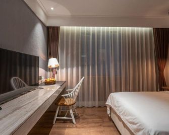 Zaixu Hotel - Wuhan - Soveværelse