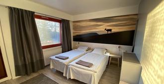 Guesthouse Borealis - Rovaniemi - Yatak Odası