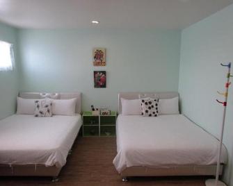 Sunny Homestay - Wujie Township - Habitación