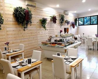 達里瓦爾諾曼塔納酒店 - 諾門塔那大道 - 羅馬 - 餐廳