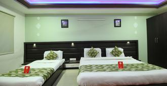 Hotel Sadbhav - אחמדאבאד - חדר שינה