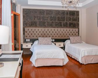 Sangay Spa Hotel - Baños - Schlafzimmer