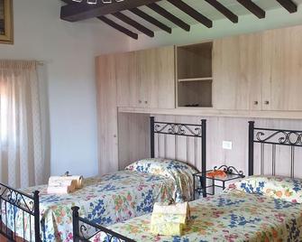 B&B Il Mandorlo - קורטונה - חדר שינה