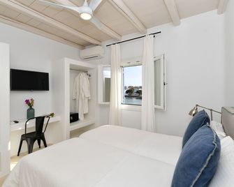 كاليبسو فيلاز - ناوسا - غرفة نوم