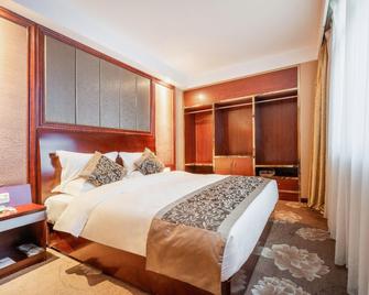 Hongzhou International Hotel - Anshun - Bedroom