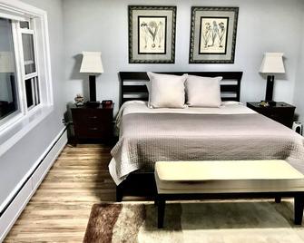 spacious 3 bedroom apartment in the heart of downtown Alpena - Alpena - Bedroom