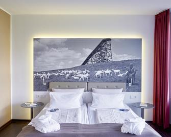 Hotel Oversum Winterberg Ski- und Vital Resort - Winterberg - Schlafzimmer