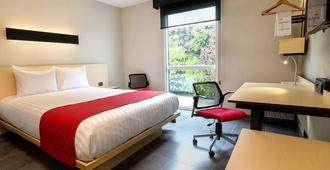 City Express Plus by Marriott Cali Colombia - Cali - Sypialnia