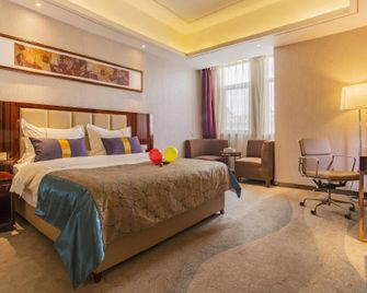 New Silk Road International Hotel - Xining - Bedroom