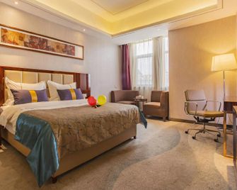 New Silk Road International Hotel - Xining - Camera da letto
