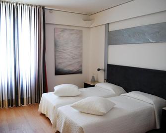 Art Hotel Museo - Prato - Schlafzimmer