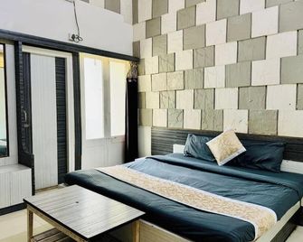 Hotel Neelam - Amrāvati - Bedroom