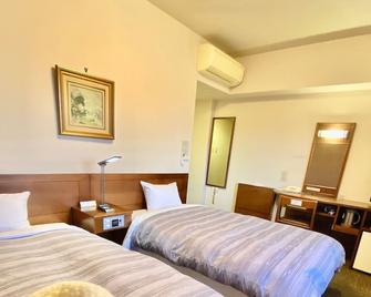 Hotel Route-Inn Koriyama Minami - Kōriyama - Bedroom