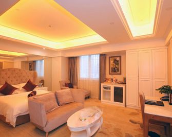 Excemon Hefei Peace Hotel - Hefei - Habitación