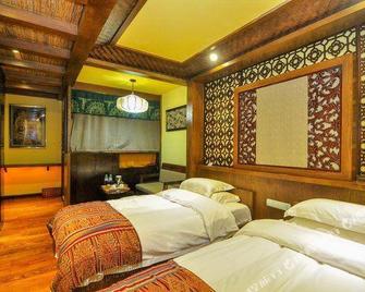 Nansai Linka International Tourist Boutique Hotel (Shangri-la Old Town) - Dêqên - Habitación