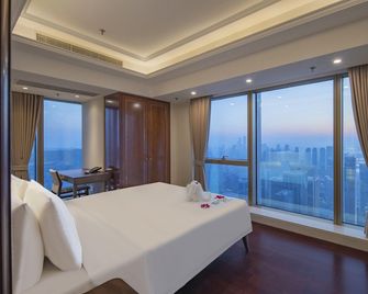 Dalian Hengli Hotel - Dalian - Bedroom