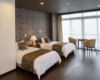 Hotel Bokaiso - טקאמאטסו - חדר שינה