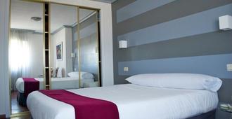 Hotel Vigo Plaza - Thị trấn Vigo - Phòng ngủ
