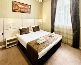 City Hotel - Taskent - Habitación