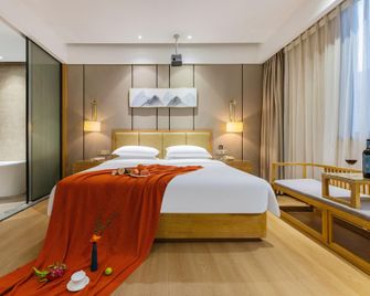 Century Hua Yue Hotel - Ganzhou - Bedroom