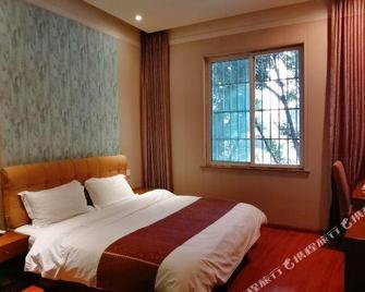 Jinlan Business Hotel - Meishan - Bedroom
