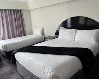 Alcamo Motel - המילטון - חדר שינה