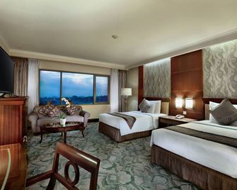 Aston Tropicana Hotel Bandung - Bandung - Yatak Odası