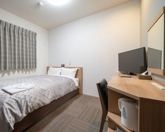 Amagasaki Plaza Hotel Hanshin Amagasaki - Amagasaki - Спальня