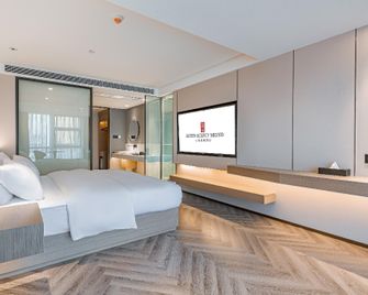 Rezen Hotel Suining Meiyue Wanda Plaza - Suining - Schlafzimmer