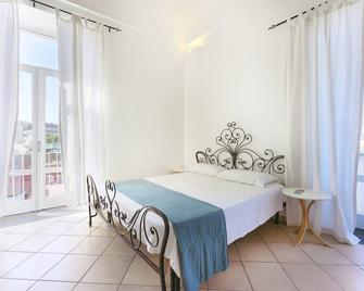 Palazzo Attila - Gioia Apartments - Procida - Sypialnia