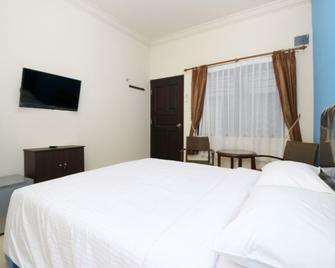 Safina Inn Syariah Sekupang Batam - Sekupang - Habitación