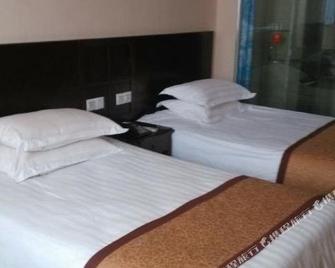 Gaozhou Hotel - Maoming - Bedroom