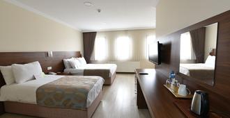 Asal Hotel - Ankara - Phòng ngủ