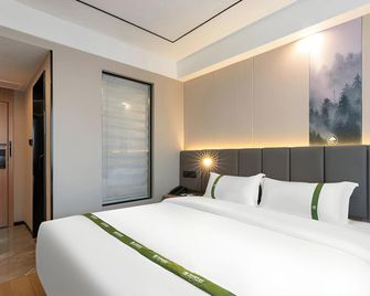 Greentree Inn Shandong Jinan Quancheng Square Business Hotel - Jinan - Schlafzimmer