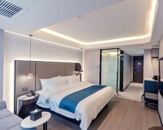 Heyi Zhishang Hotel Fuxin High-speed Railway Station Wanda Plaza - Fuxin - Habitación