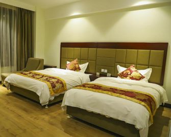 Hongyuan Hotspring Hotel - Yingkou - Schlafzimmer
