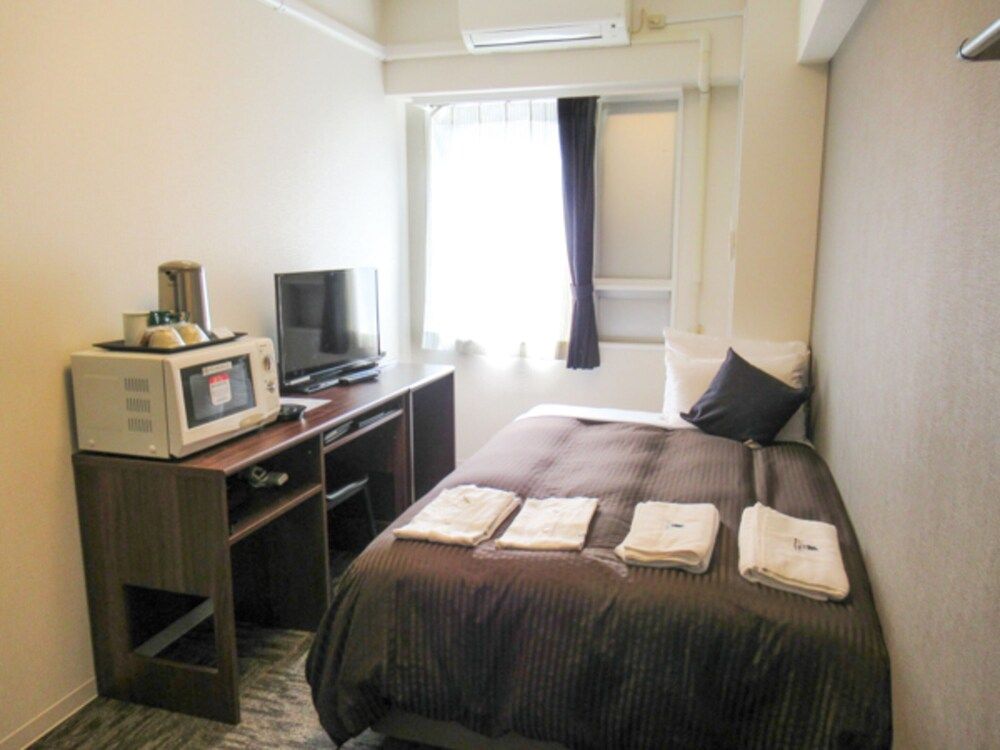 Hotel Livemax Kawasaki Ekimae - Kawasaki - Bedroom