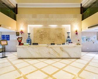 Genius Hotel - Dazhou - Front desk