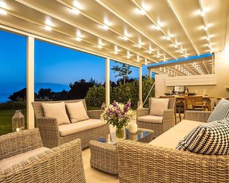 Luxury Beach Villa with an Infinity Pool - Elia Nikitis - Patio