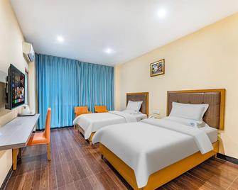 Shenzhen Kaixin Hotel - Shenzhen - Bedroom